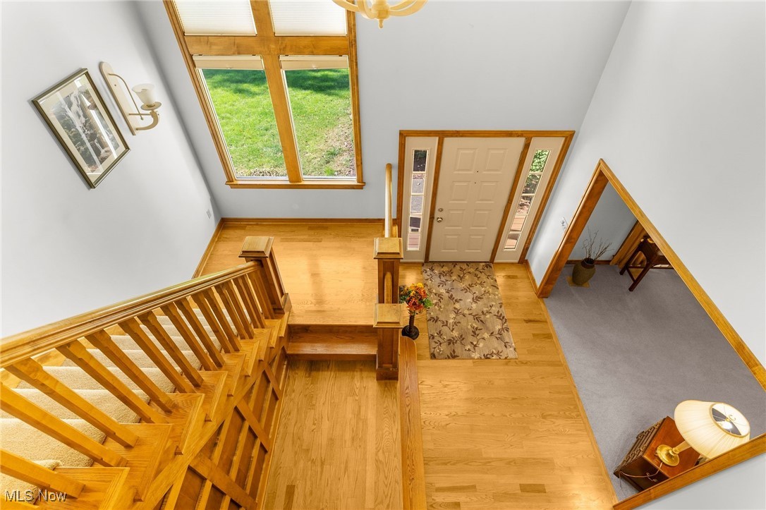 2430 Howland Wilson Road Northeast Warren, OH 44484 - Photo 13 of 33 Foyer entrance with hardwood / wood-style floors and a high ceiling