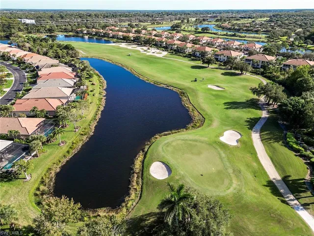 an aerial view of a golf course with swimming pool