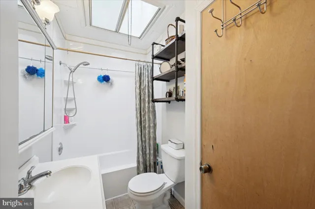 a view of a patio with chair and tables