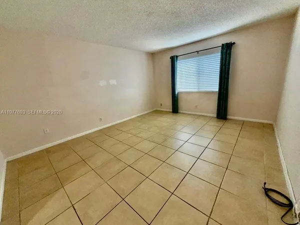 a view of room and garage