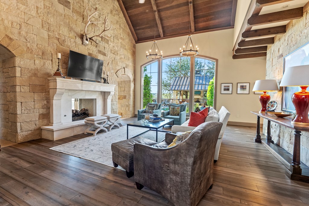 2328 Boot Ranch Circle Fredericksburg, TX 78624 - Photo 3 of 10 a living room with furniture fireplace and flat screen tv