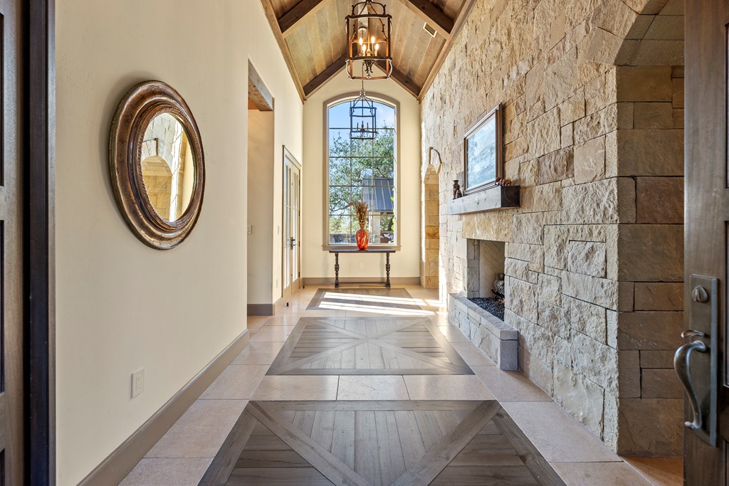 2328 Boot Ranch Circle Fredericksburg, TX 78624 - Photo 4 of 10 a view of a hallway with washer and dryer