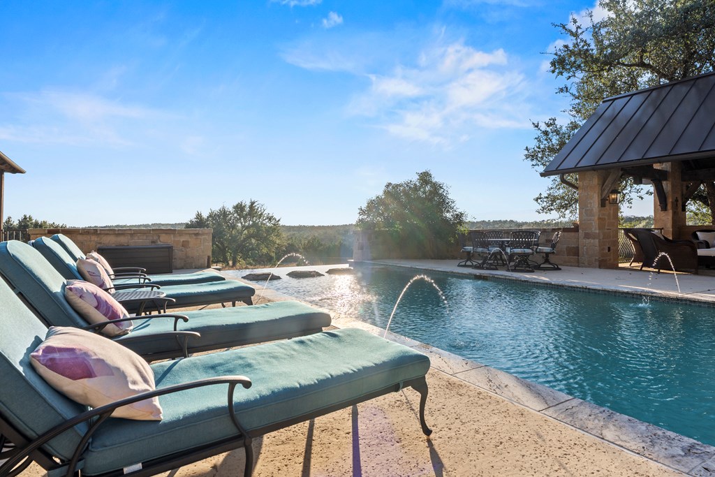 2328 Boot Ranch Circle Fredericksburg, TX 78624 - Photo 10 of 10 a view of a balcony with furniture