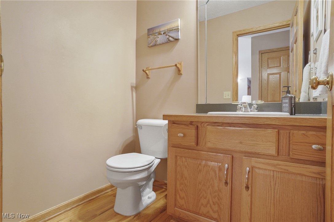 4265 Ridge Crest Drive Akron, OH 44321 - Photo 10 of 49 Bathroom with vanity and wood finished floors