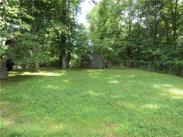 3165 Powers Bridge Road Manchester, TN 37355 - Photo 4 of 11 The shady back yard