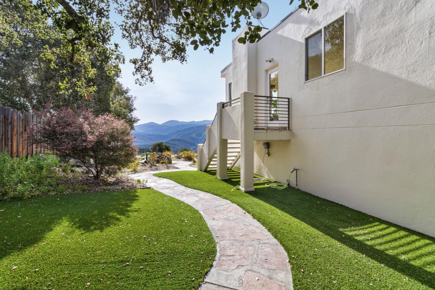 320 El Caminito Road Carmel Valley, CA 93924 - Photo 45 of 62 a view of an house with backyard space and garden