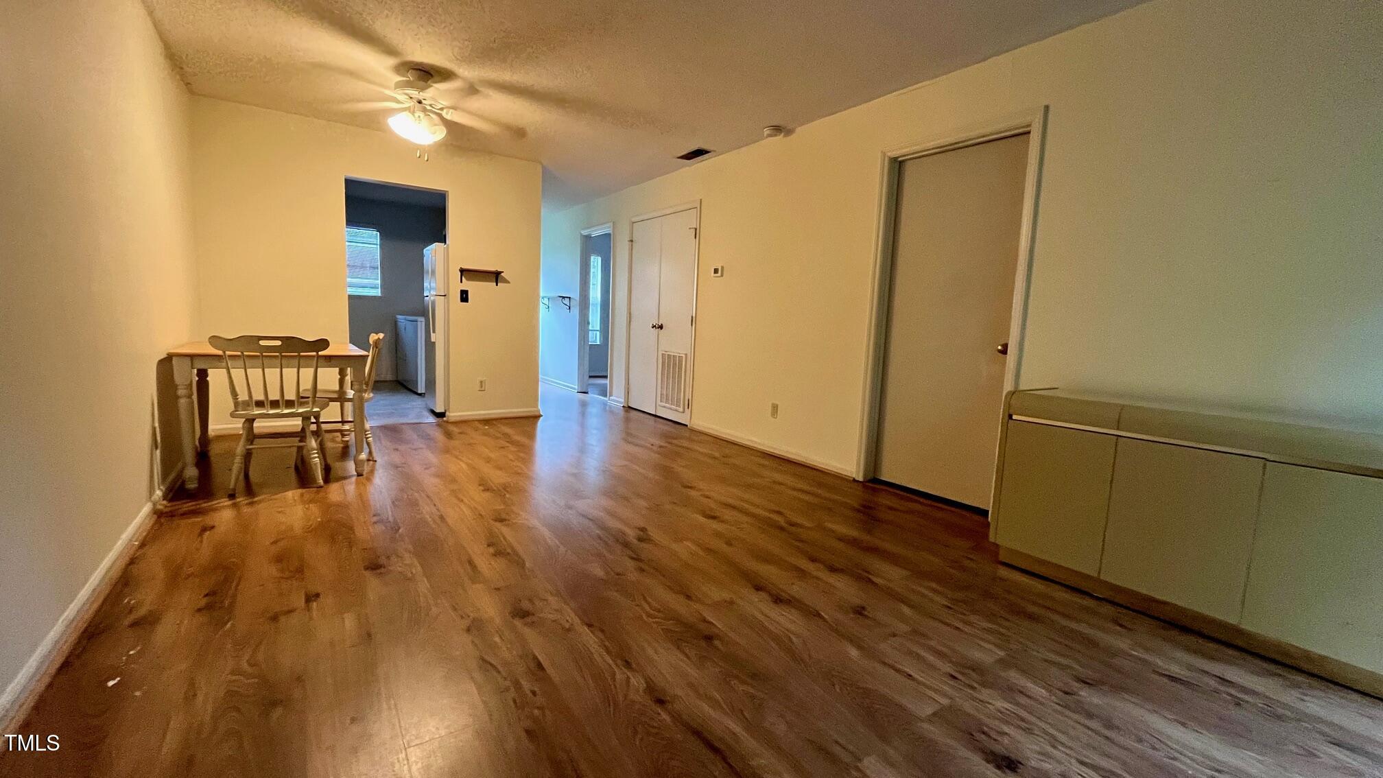 334 Ashley Forest Road Chapel Hill, NC 27514 - Photo 5 of 7 a view of a livingroom with wooden floor