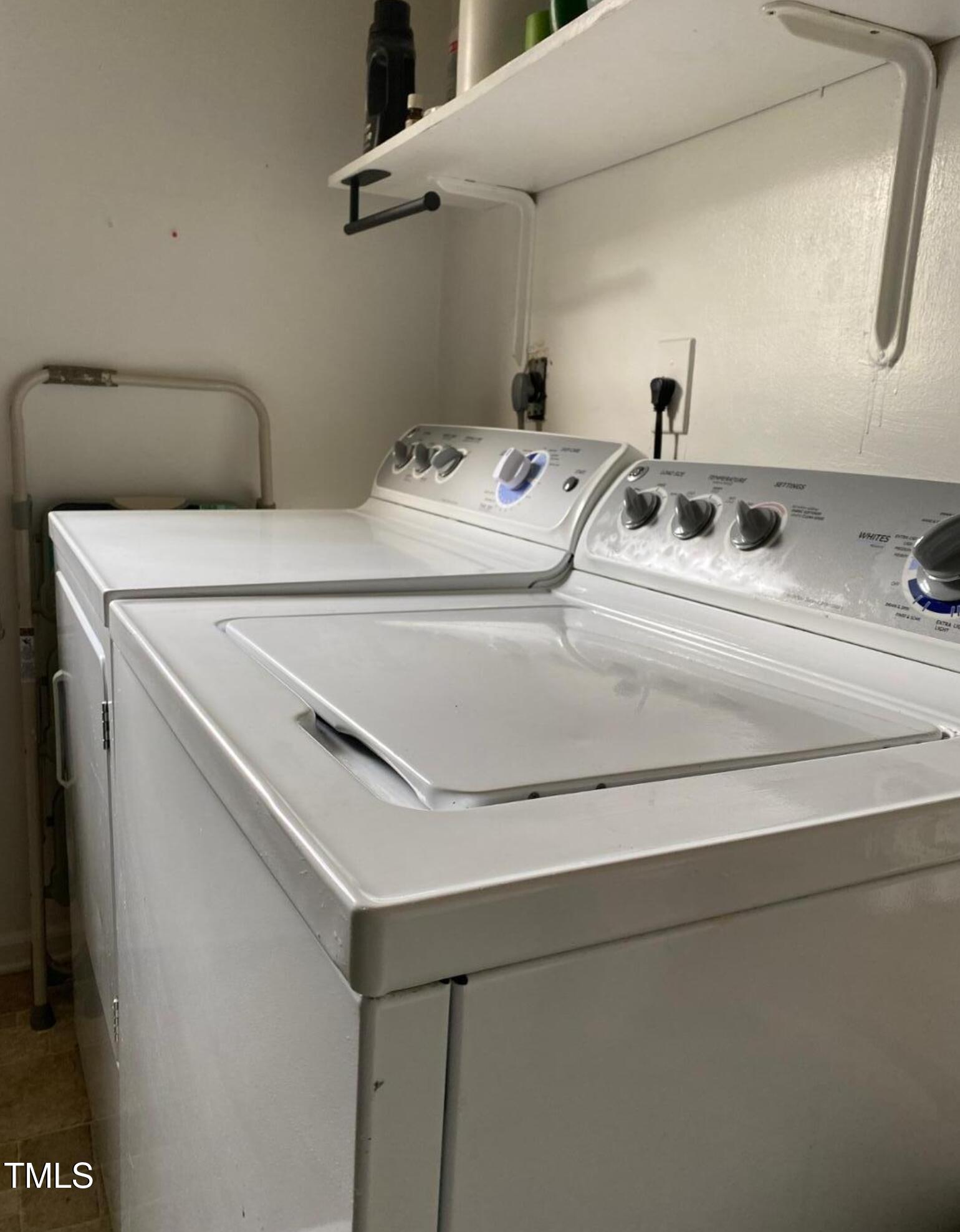 334 Ashley Forest Road Chapel Hill, NC 27514 - Photo 7 of 7 a utility room with dryer and washer