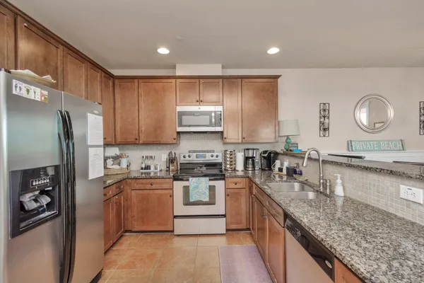 $380,000 | 26550 Mangrove Drive, Unit 203, Galveston, TX 77554