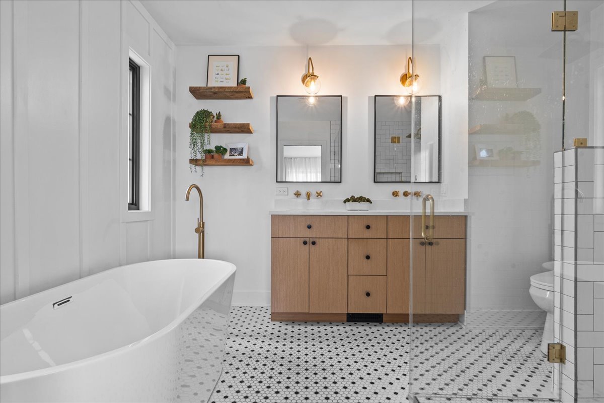 1975 Valley View Road Northfield, IL 60093 - Photo 27 of 45 a bathroom with a double vanity sink mirror and toilet