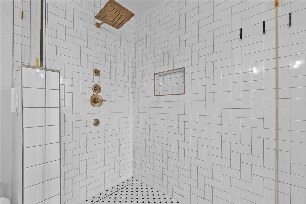 1975 Valley View Road Northfield, IL 60093 - Photo 29 of 45 a bathroom with a shower