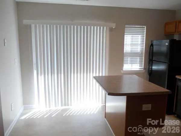 a view of a room with windows