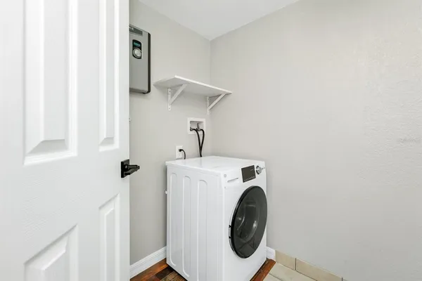 a utility room with dryer and washer