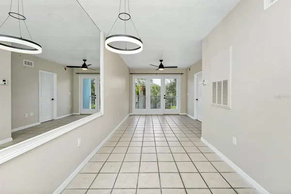 a view of an empty room and window