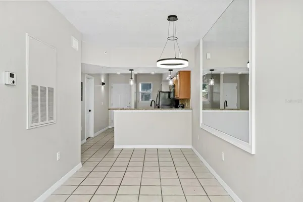 a view of a bathroom with sink shower and bathtub
