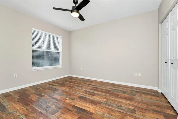 a view of empty room with windows