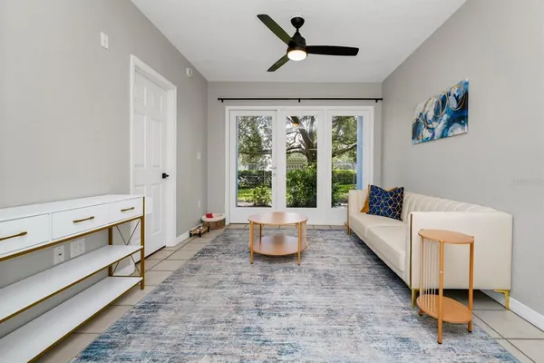 a living room with furniture and a window