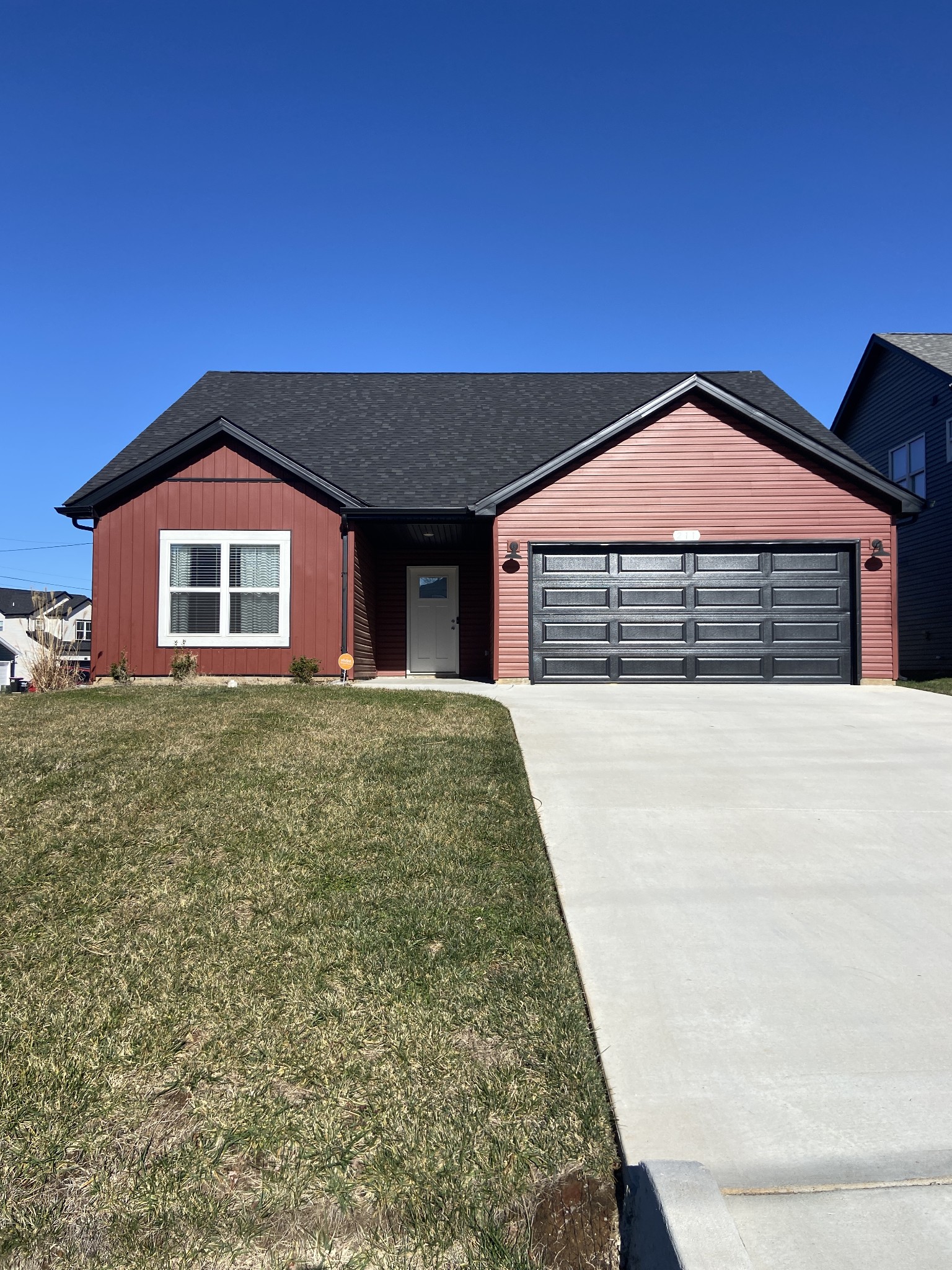 211 King Road Clarksville, TN 37042 - Photo 1 of 35 a front view of a house with a garden