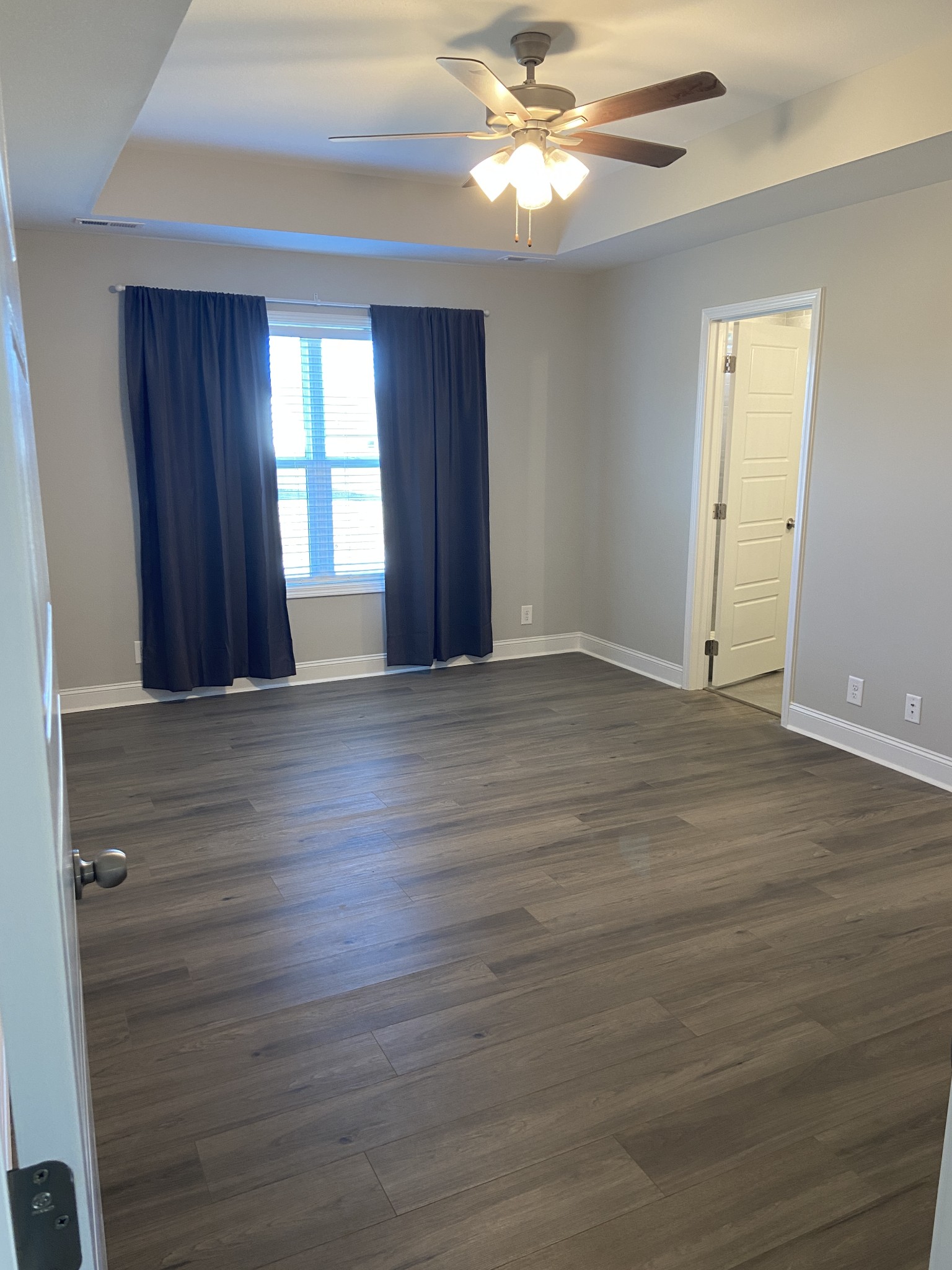 211 King Road Clarksville, TN 37042 - Photo 14 of 35 an empty room with wooden floor closet and windows