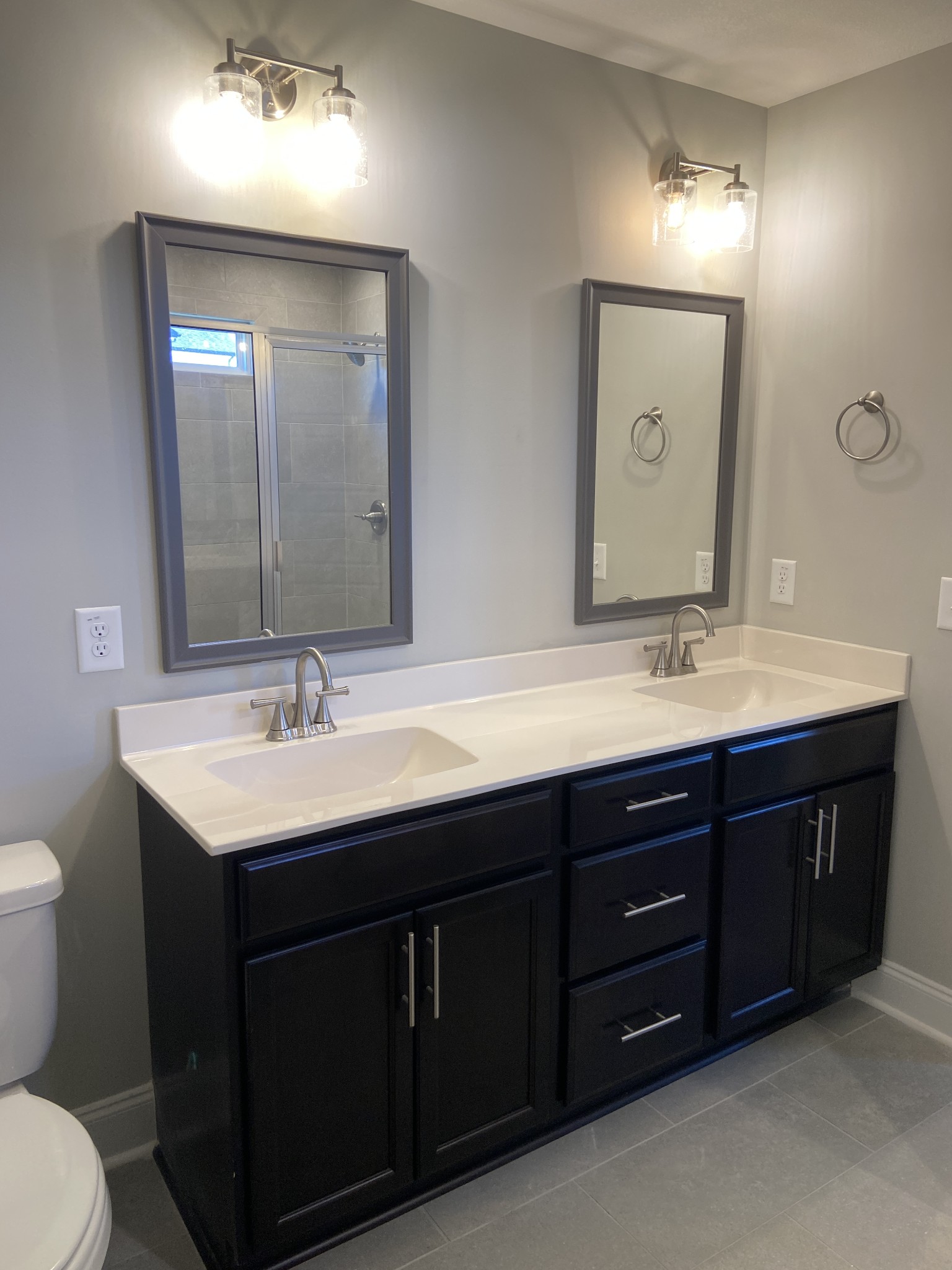 211 King Road Clarksville, TN 37042 - Photo 16 of 35 a bathroom with a double vanity sink and a toilet
