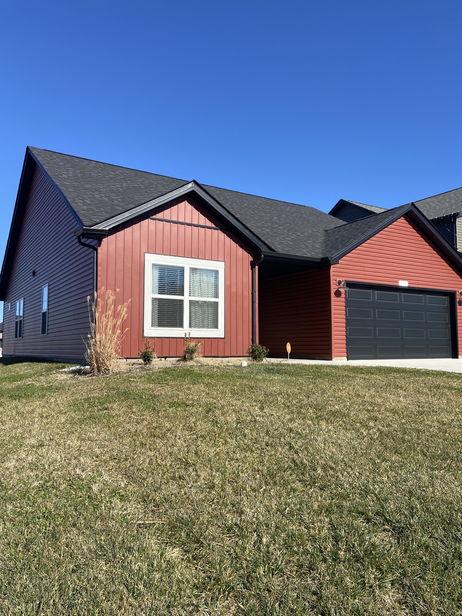 211 King Road Clarksville, TN 37042 - Photo 2 of 35 a front view of a house with a garden