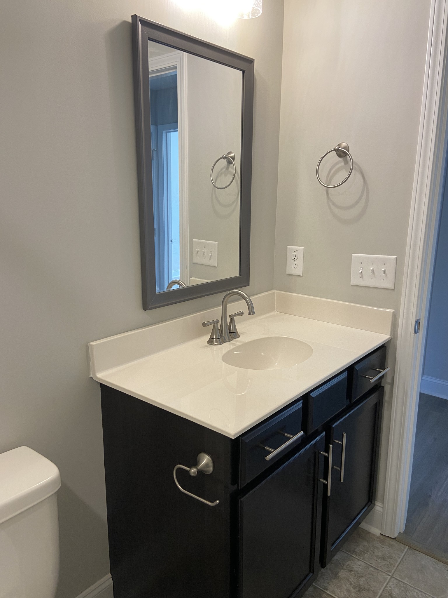 211 King Road Clarksville, TN 37042 - Photo 25 of 35 a bathroom with a sink vanity and a mirror