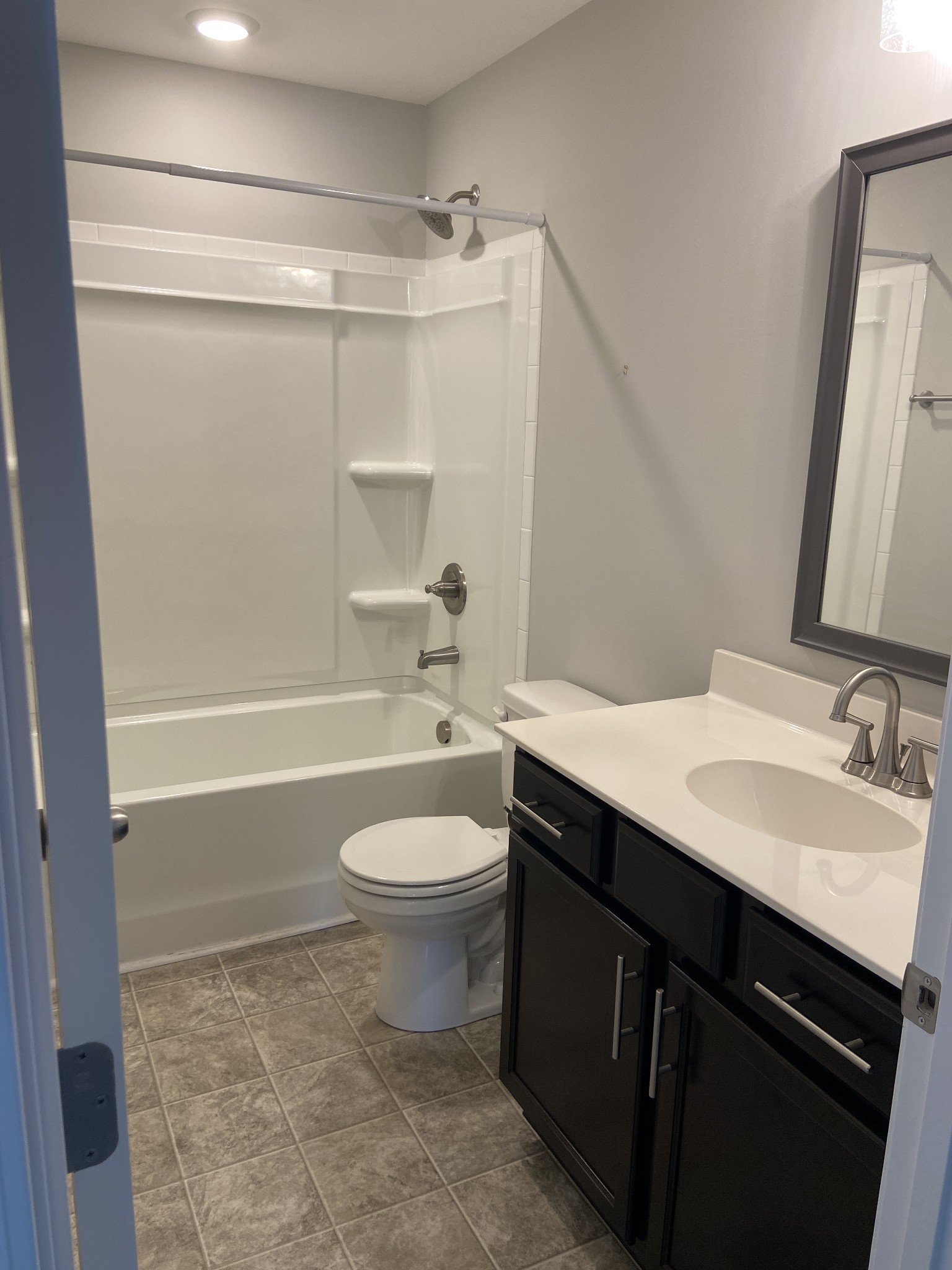211 King Road Clarksville, TN 37042 - Photo 26 of 35 a bathroom with a sink a toilet and shower