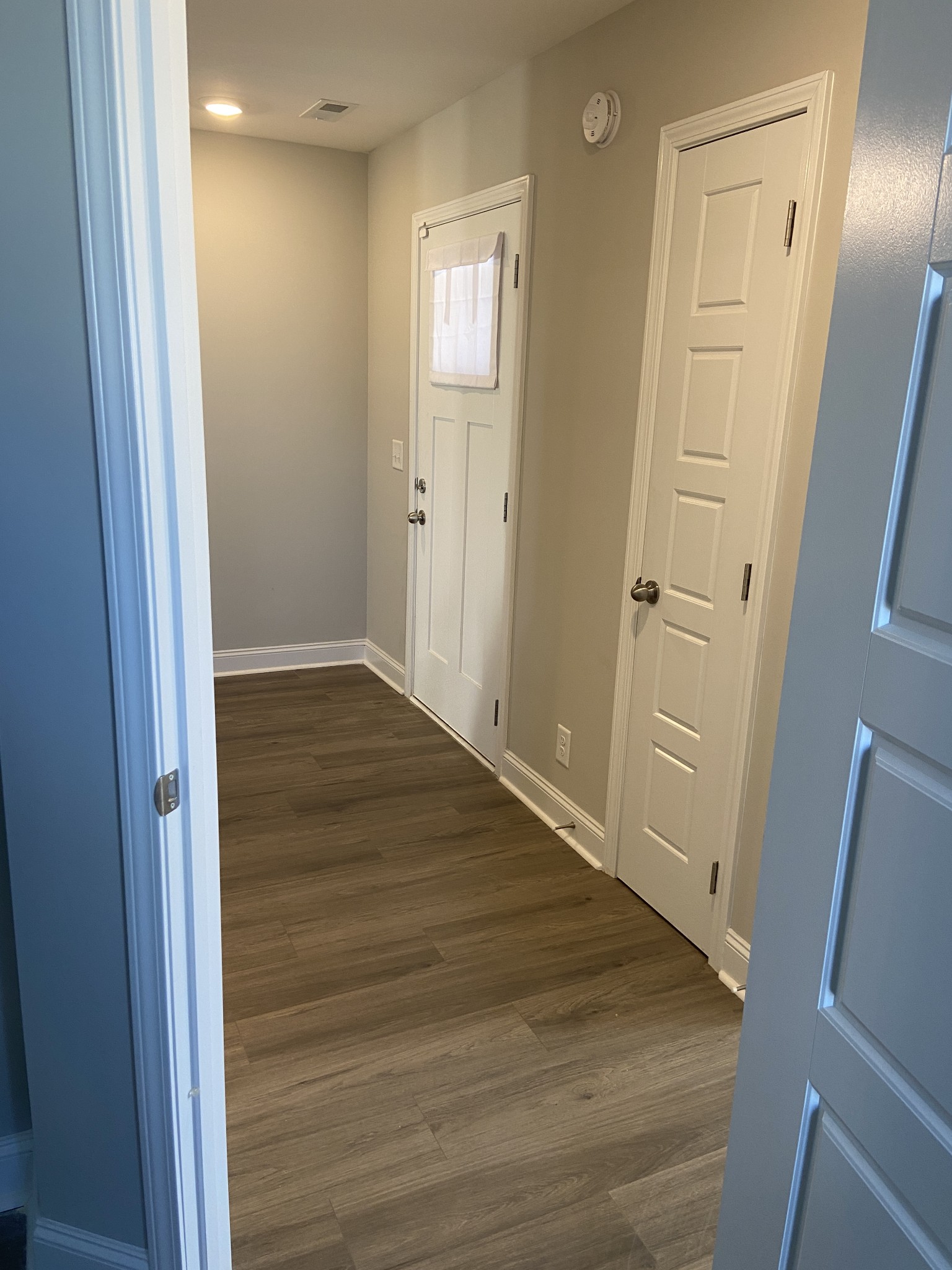 211 King Road Clarksville, TN 37042 - Photo 3 of 35 a view of a hallway with wooden floor