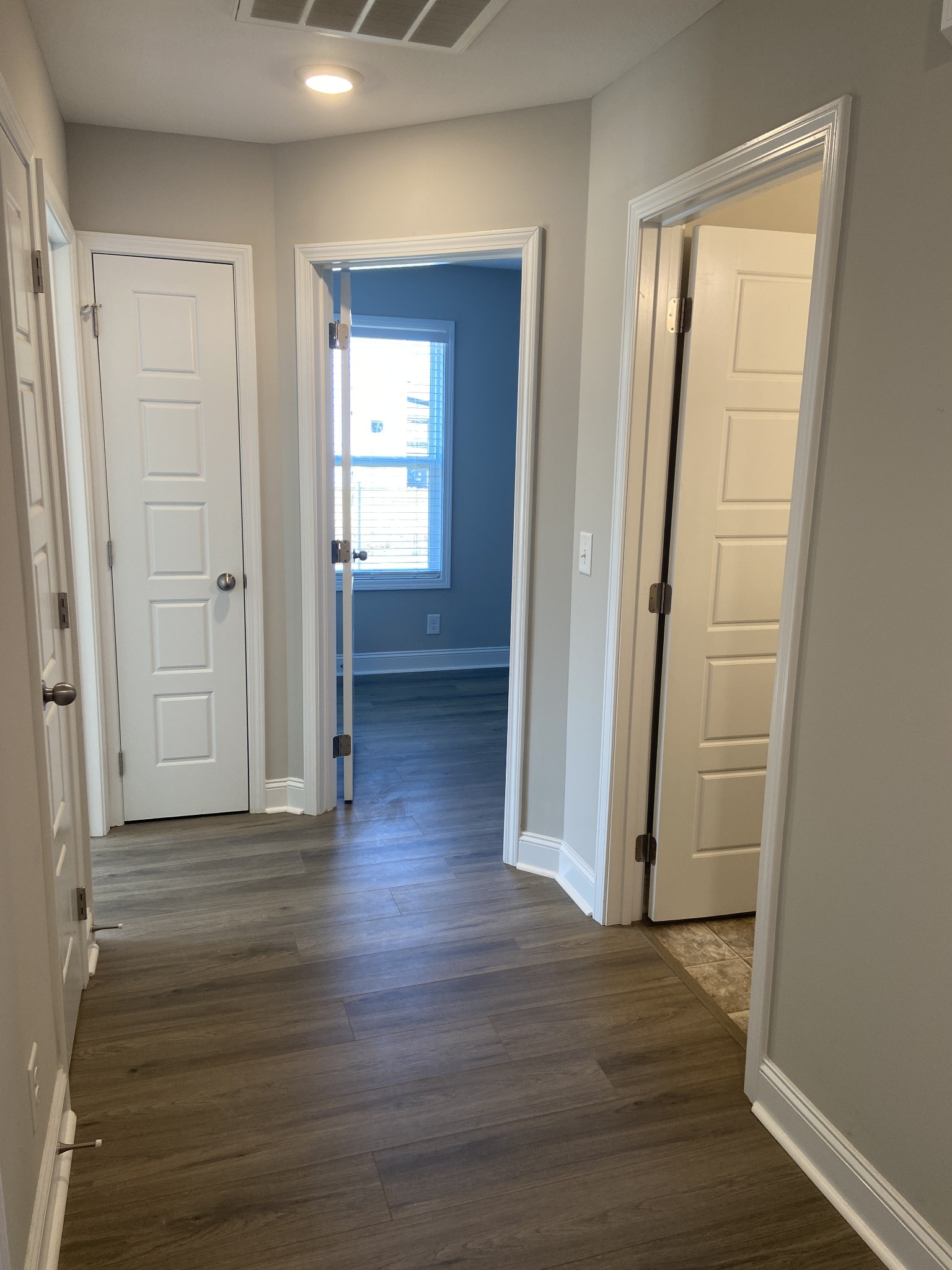 211 King Road Clarksville, TN 37042 - Photo 4 of 35 an empty room with wooden floor and closet