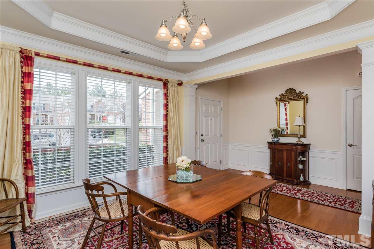 5112 Kate Denson Way Raleigh, NC 27612 - Photo 6 of 25 a view of a dining room with furniture window and outside view