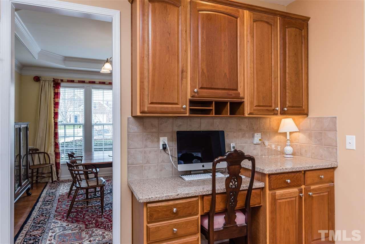 5112 Kate Denson Way Raleigh, NC 27612 - Photo 9 of 25 a kitchen with a sink cabinets and appliances