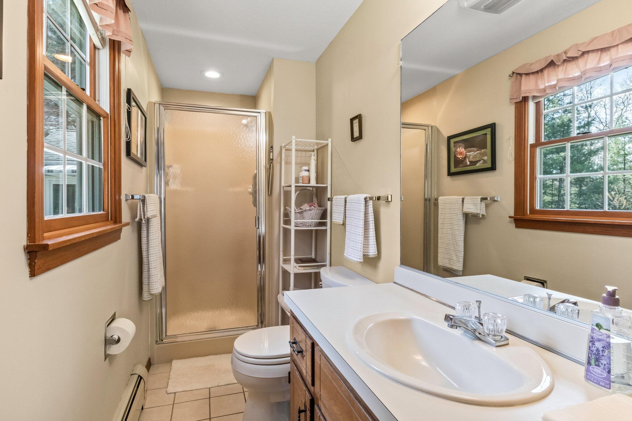 131 Seth Parker Road Centerville, MA 02632 - Photo 12 of 55 a bathroom with a sink toilet and shower
