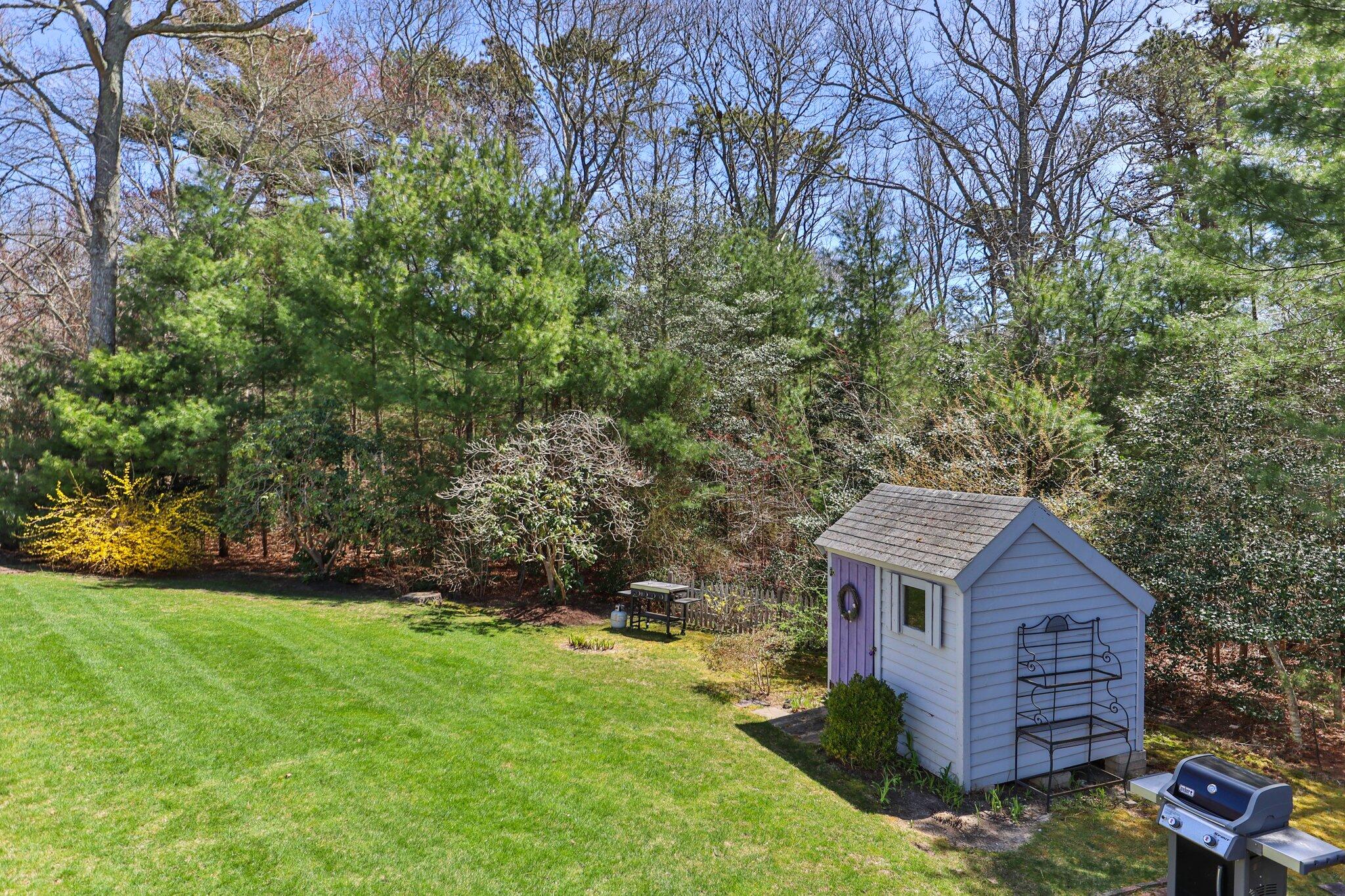 131 Seth Parker Road Centerville, MA 02632 - Photo 19 of 55 front view of a house with a yard