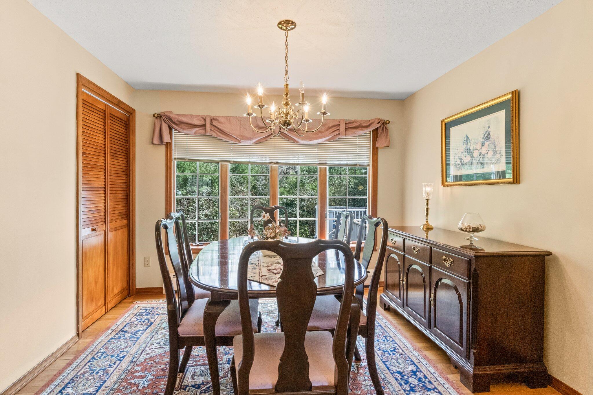131 Seth Parker Road Centerville, MA 02632 - Photo 28 of 55 a view of a dining room with furniture window and outside view