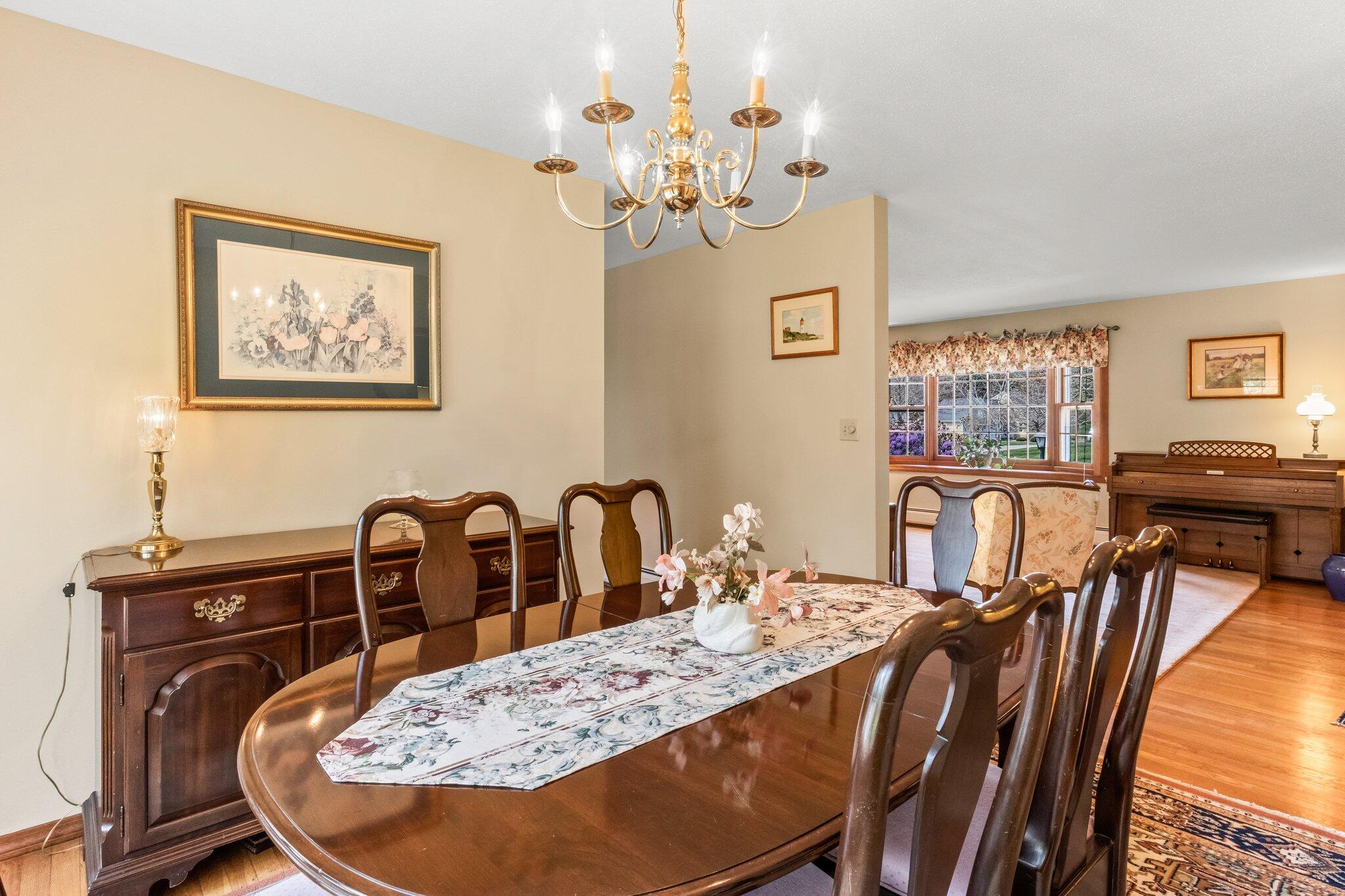 131 Seth Parker Road Centerville, MA 02632 - Photo 29 of 55 a view of a dining room with furniture