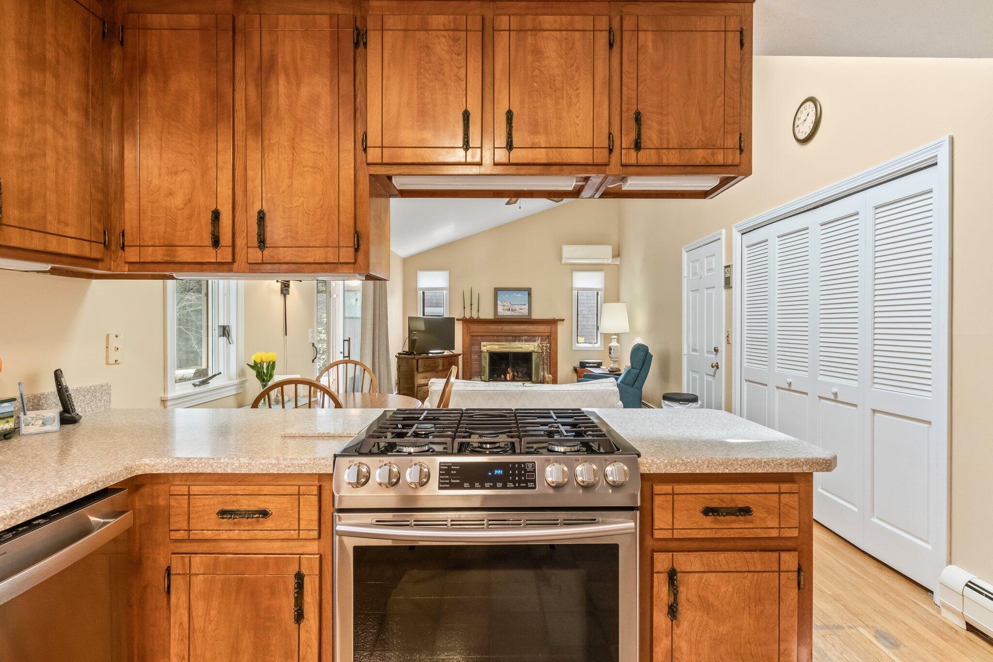 131 Seth Parker Road Centerville, MA 02632 - Photo 32 of 55 a stove top oven sitting inside of a kitchen