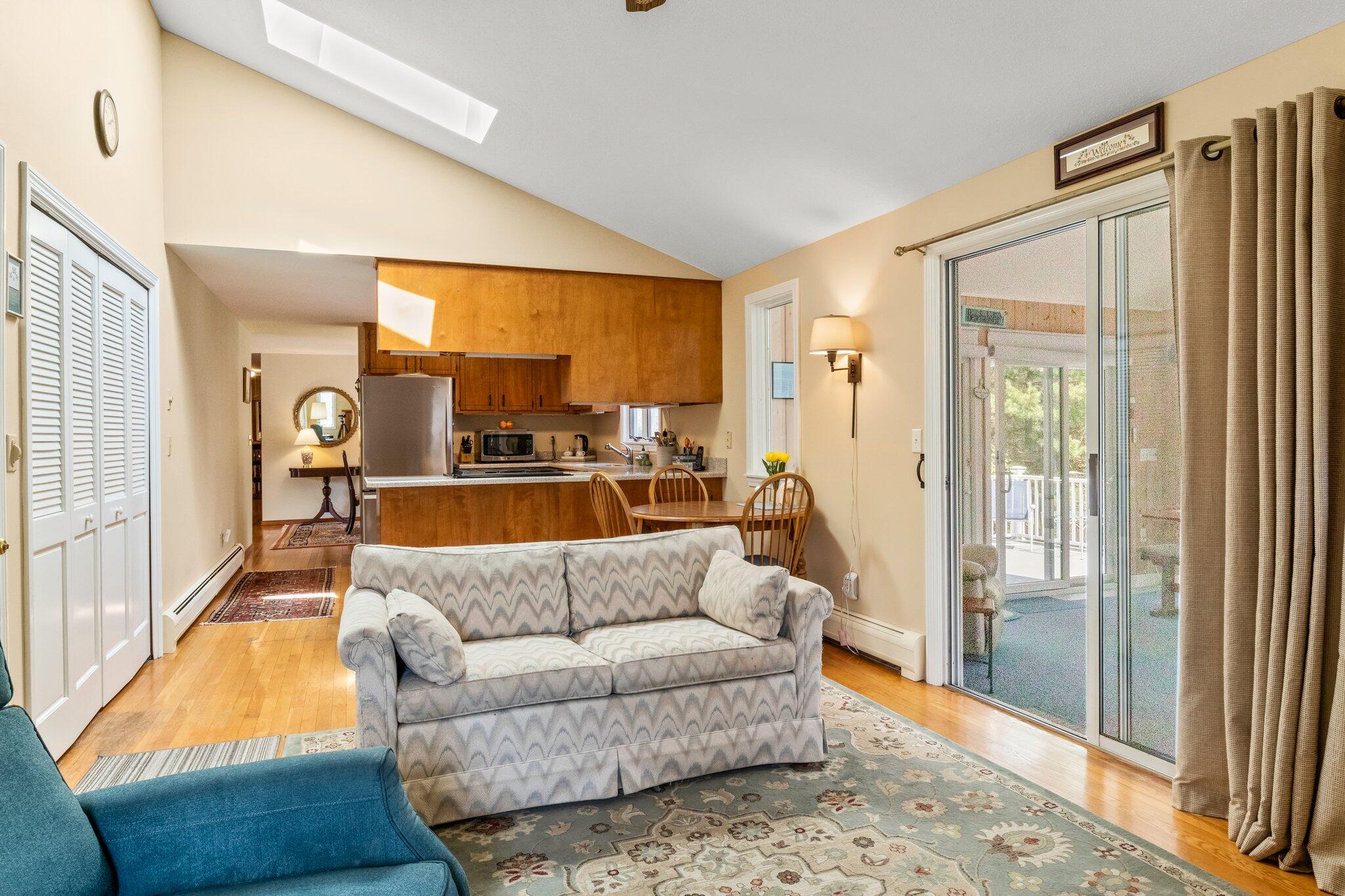131 Seth Parker Road Centerville, MA 02632 - Photo 35 of 55 a living room with furniture and a large window