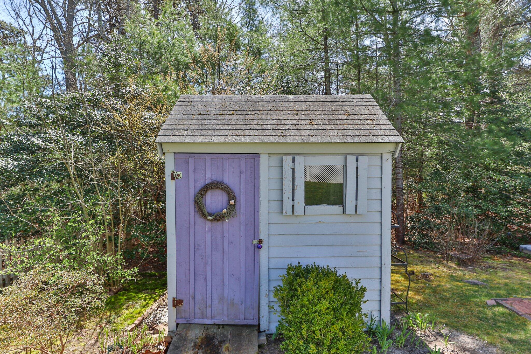 131 Seth Parker Road Centerville, MA 02632 - Photo 46 of 55 a view of a house with a tree
