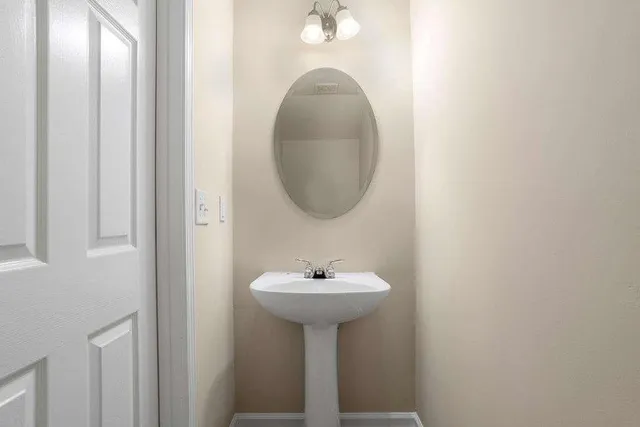 a sink with a mirror