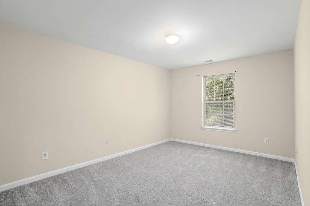 2757 Keystone Avenue Lithonia, GA 30058 - Photo 22 of 28 an empty room with a window