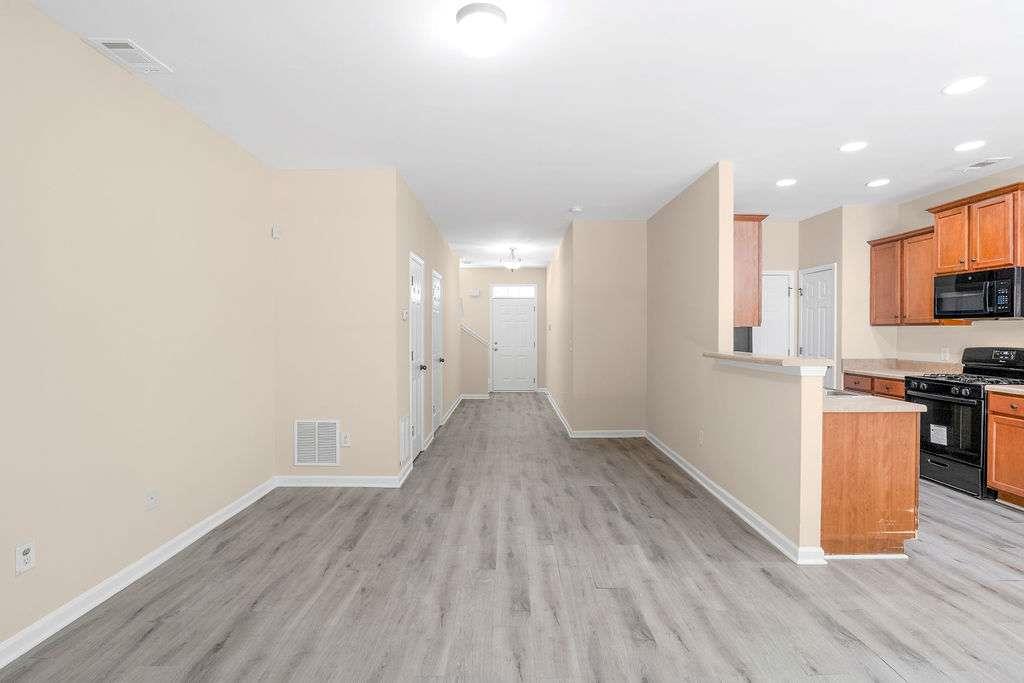 2757 Keystone Avenue Lithonia, GA 30058 - Photo 3 of 28 a view of a kitchen with wooden floor