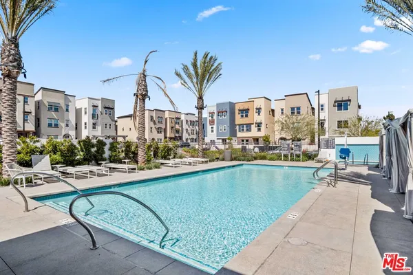 a view of a swimming pool next to a building