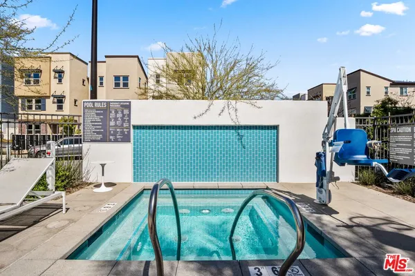 a view of swimming pool outdoor seating