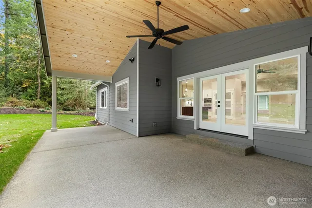 a view of an empty room with a balcony
