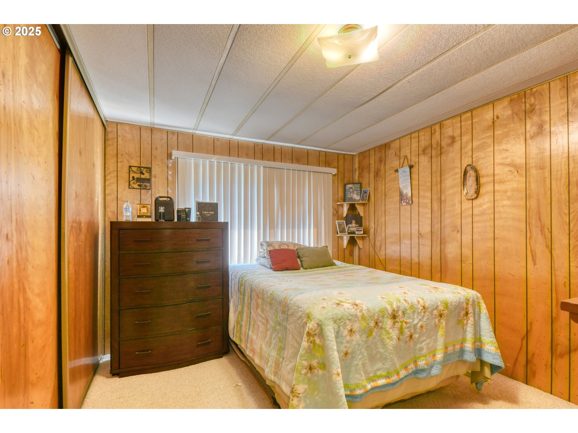 10 Southwest Sunrise Court Hermiston, OR 97838 - Photo 15 of 20 a bedroom with a bed and a dresser