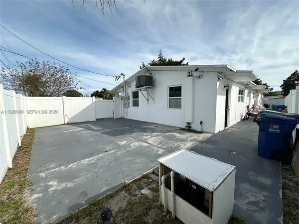 a view of a house with a garage