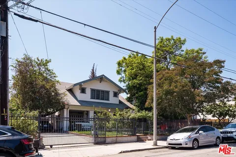 a view of a car park in front of a building