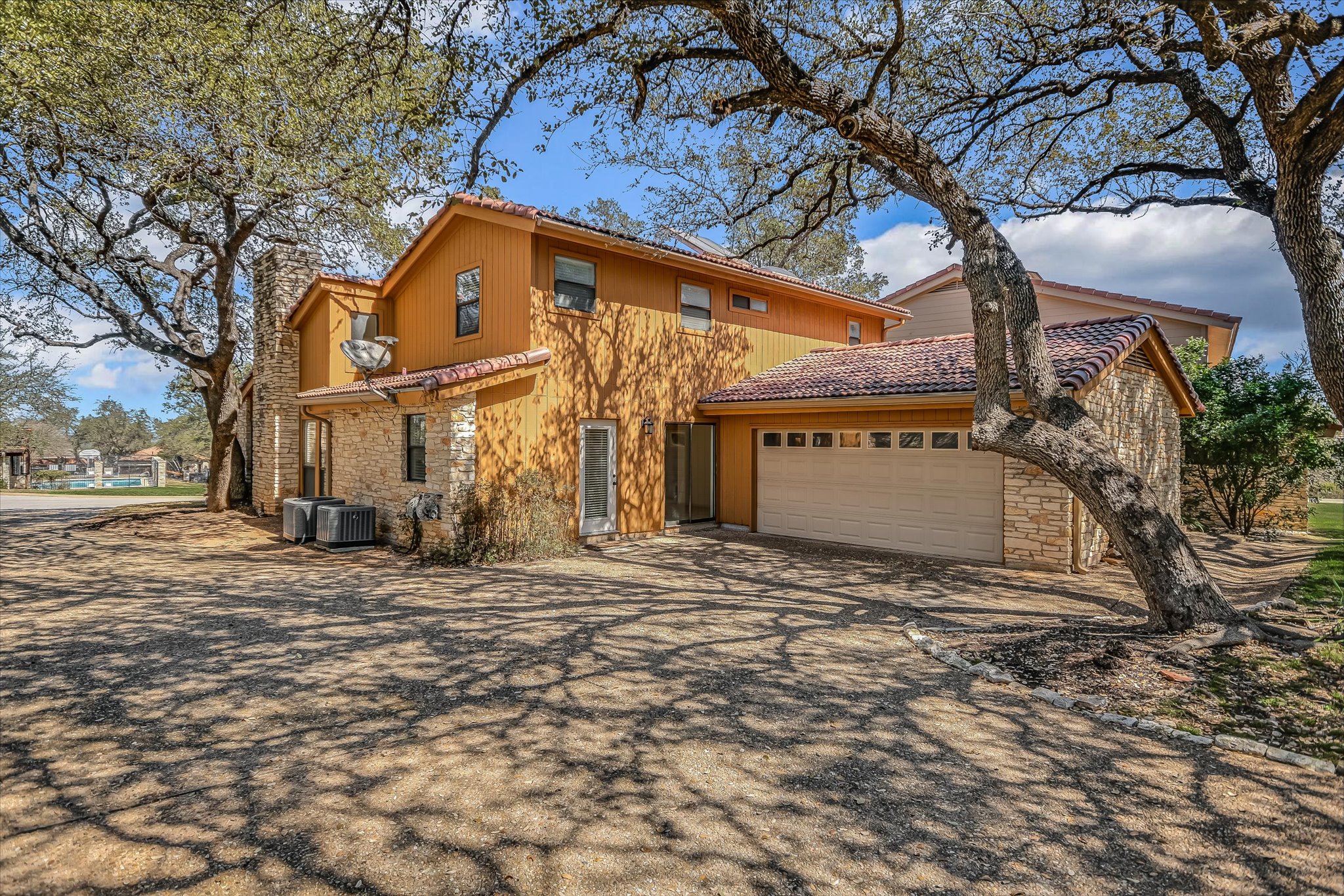 105 Crescent Bluff Austin, TX 78734 - Photo 23 of 28 a view of a house with a snow in the yard