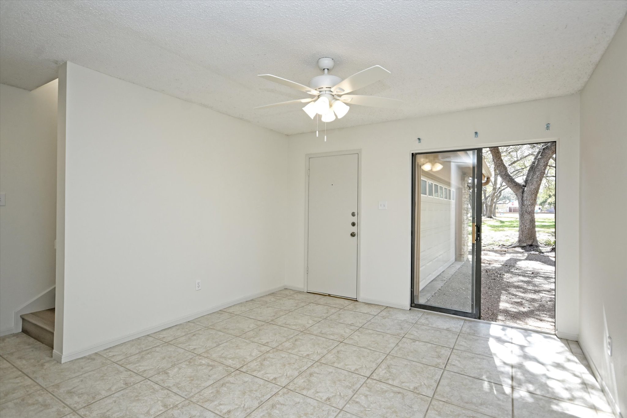 105 Crescent Bluff Austin, TX 78734 - Photo 9 of 28 a view of an empty room with a window