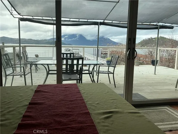 a view of a swimming pool with chairs
